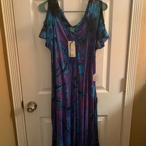 Beautiful long lacy peekaboo shoulder dress